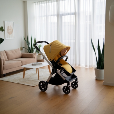 Bright yellow compact stroller with a modern design, placed in a stylish living room with natural light and minimalistic decor.