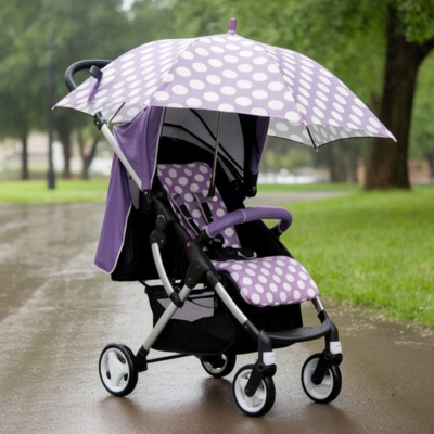 Purple and white polka dot baby stroller with a matching umbrella cover, parked on a rainy park path, providing full rain protection for infants and toddlers in wet weather.